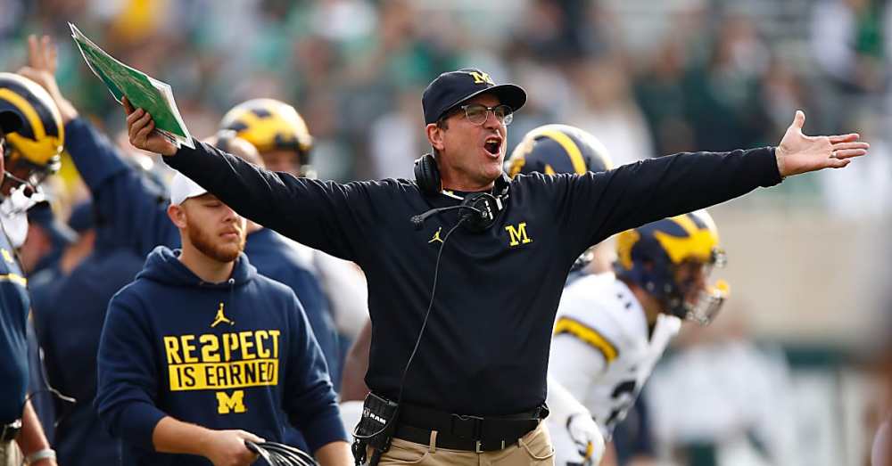 gregory-shamus-jim-harbaugh-michigan-getty-images-wolverines_qmfmhi